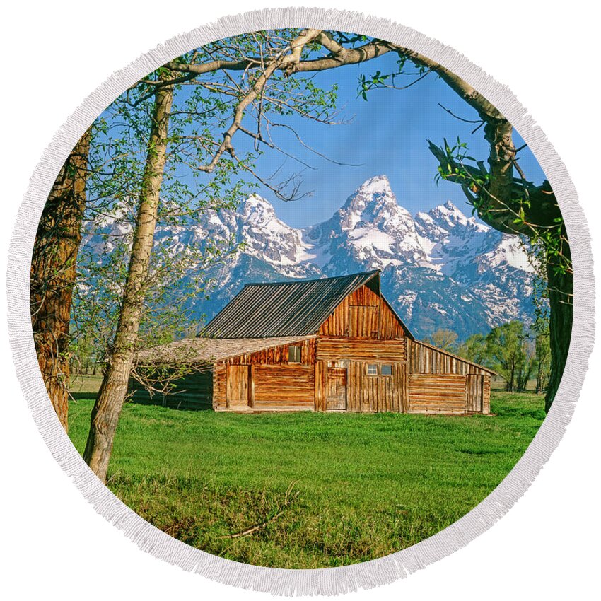 Historic Barn And Grand Teton National Park Wyoming Usa Round Beach Towel featuring the photograph Barn and Tetons by Mark Miller