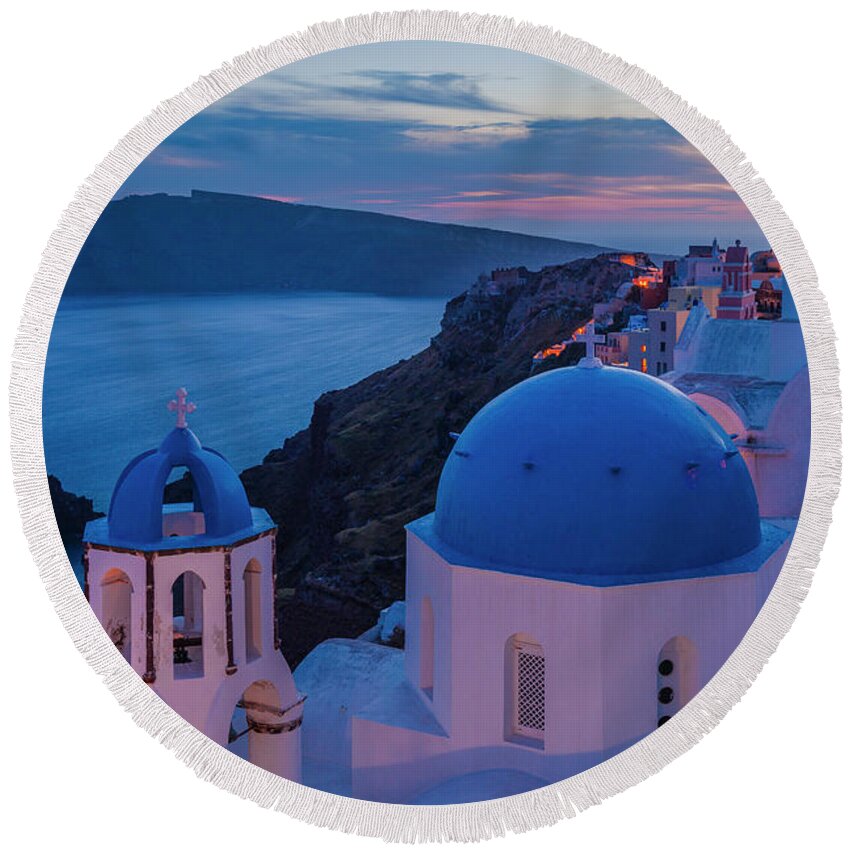 Aegean Sea Round Beach Towel featuring the photograph Blue Domes Of Santorini by Evgeni Dinev