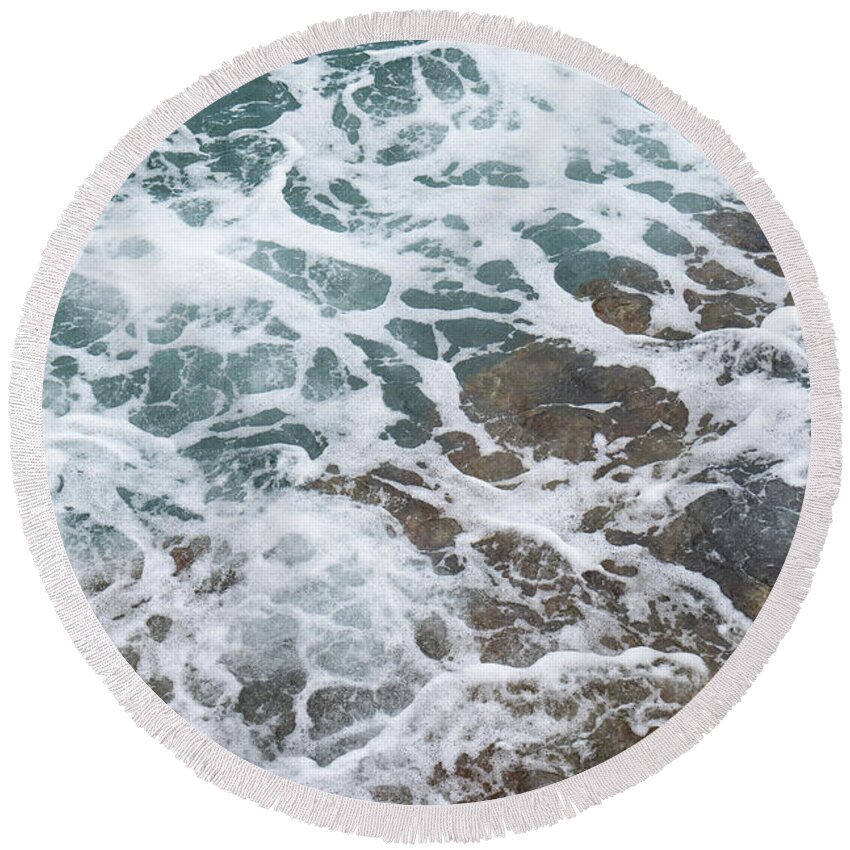 Sea Water Round Beach Towel featuring the photograph Blue sea water flows over the rocks 3 by Adriana Mueller