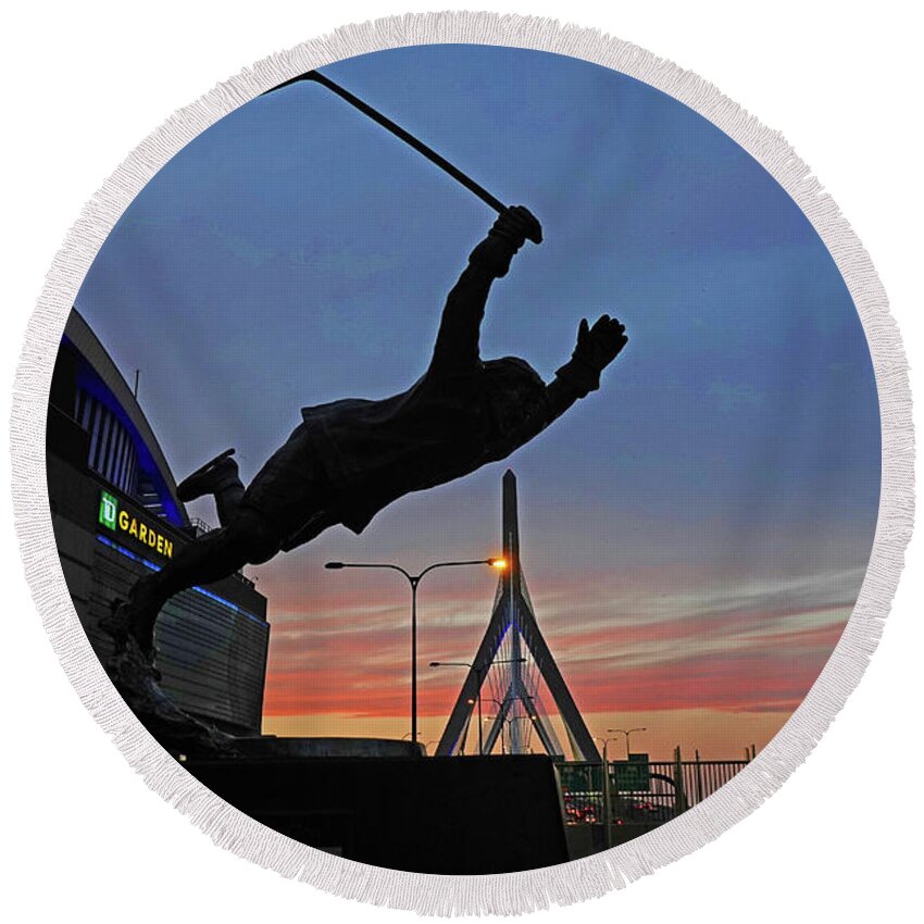 Bobby Orr Statue leaping through the Zakim Bridge at Sunset