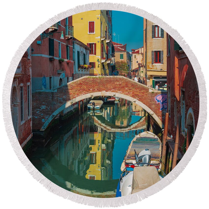 Canal Round Beach Towel featuring the photograph Brilliant colors in a Venice canal by The P