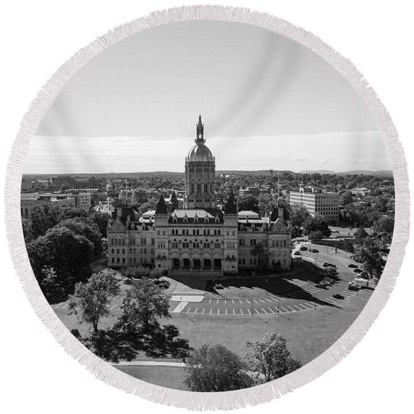 Democrats Round Beach Towel featuring the photograph Connecticut state capitol building in Hartford Connecticut in black and white by Eldon McGraw