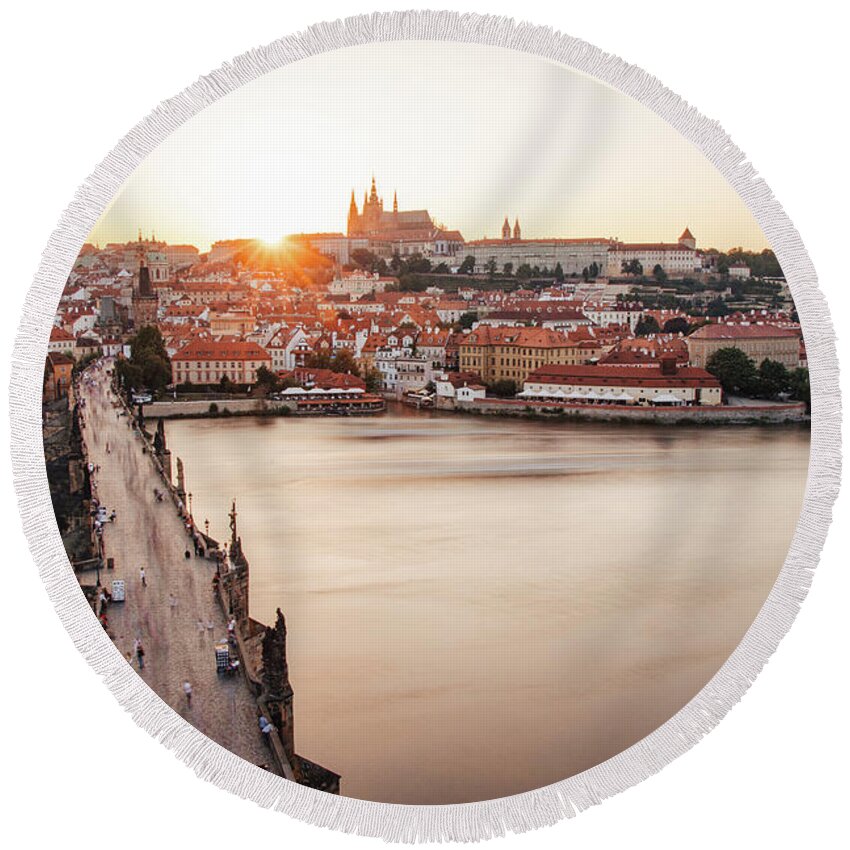 Castle Round Beach Towel featuring the photograph Czech capital city with Charles bridge at sunset by Vaclav Sonnek