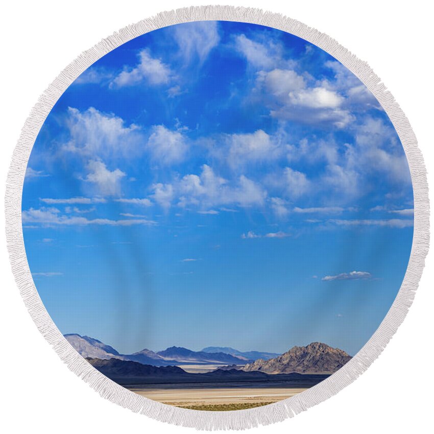Adventure Round Beach Towel featuring the photograph Desert Clouds by Pelo Blanco Photo