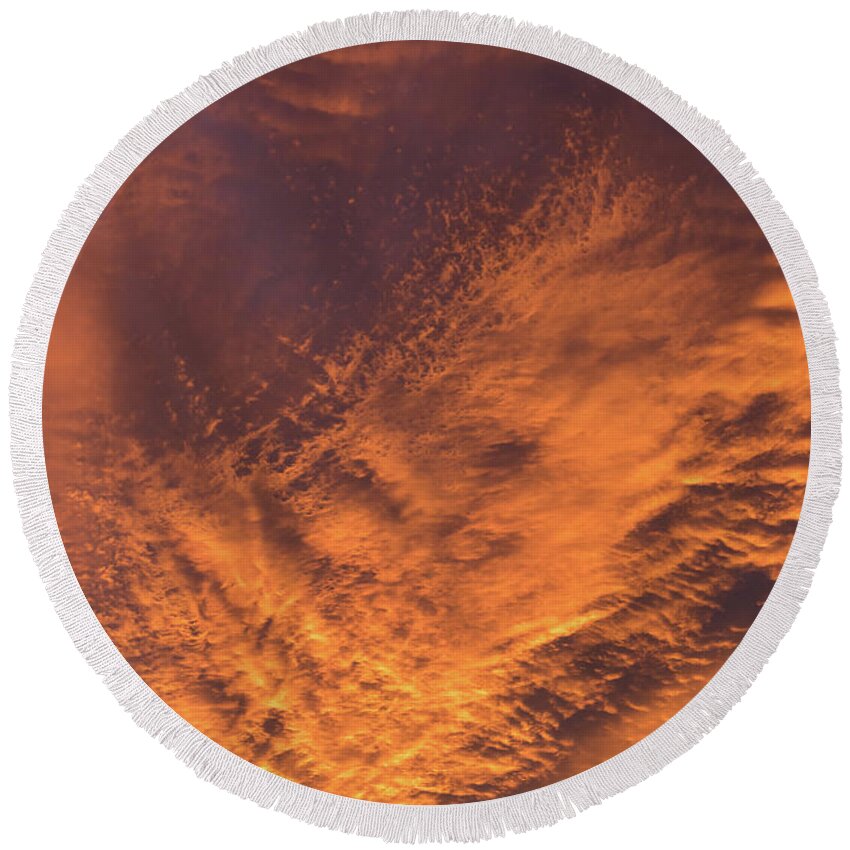 Clouds Round Beach Towel featuring the photograph Glowing sunset sky with deep orange clouds by Adriana Mueller