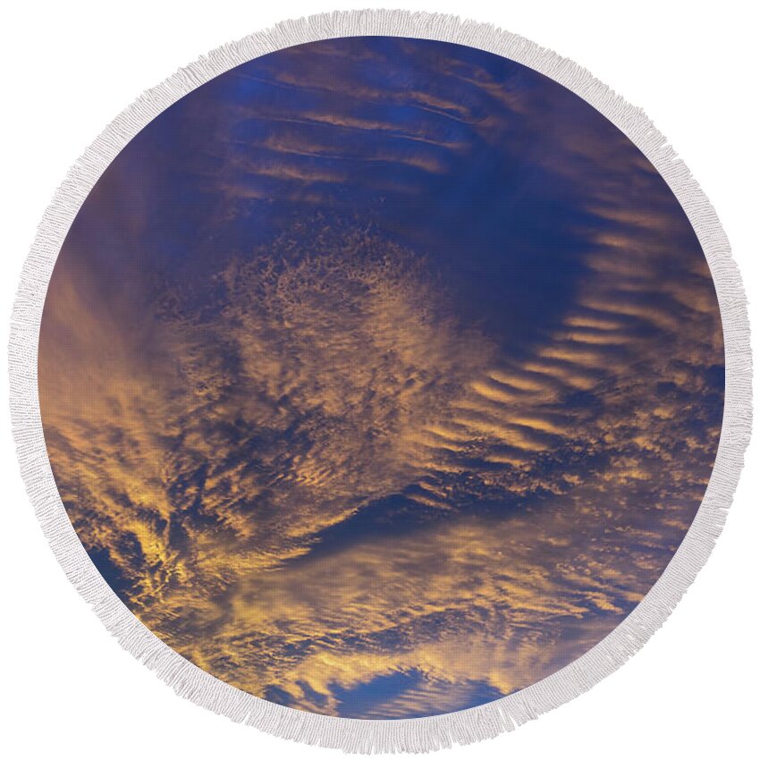 Clouds Round Beach Towel featuring the photograph Golden and dark blue cloudscape at sunset by Adriana Mueller