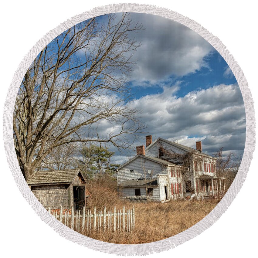 White Fence Round Beach Towel featuring the photograph Haunted Pump House by David Letts