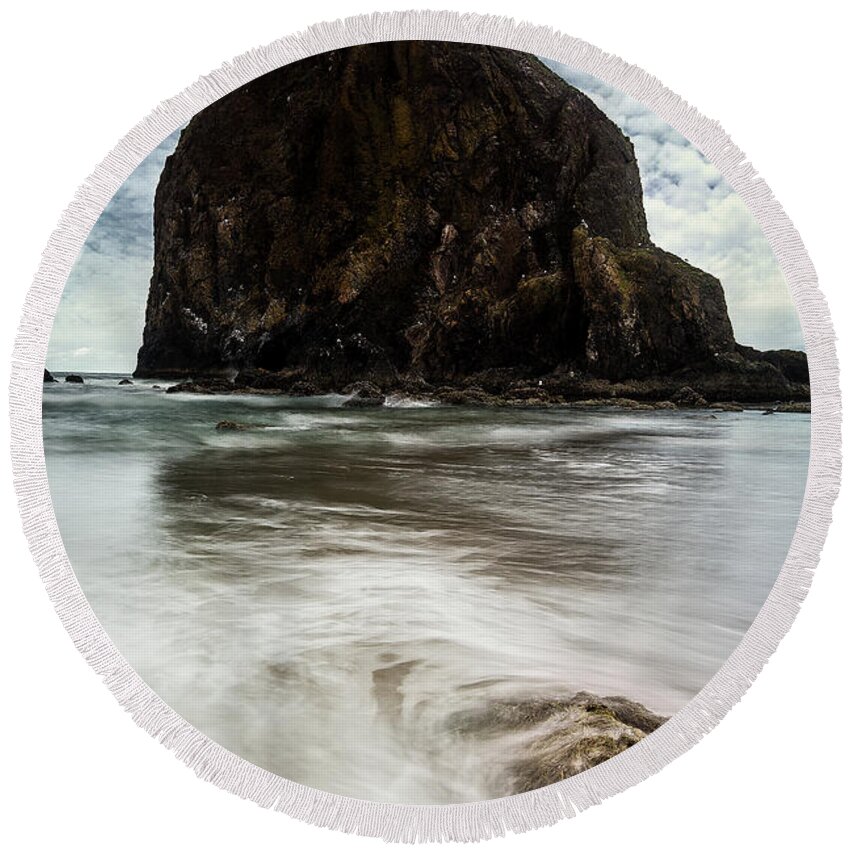 Oregon Round Beach Towel featuring the photograph Haystack Rock in Oregon by Jon Glaser