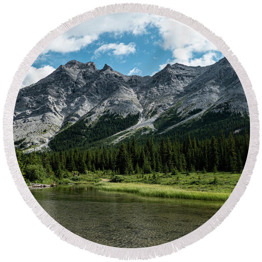 River Round Beach Towel featuring the photograph headwaters of the Elbow River by Karen Rispin