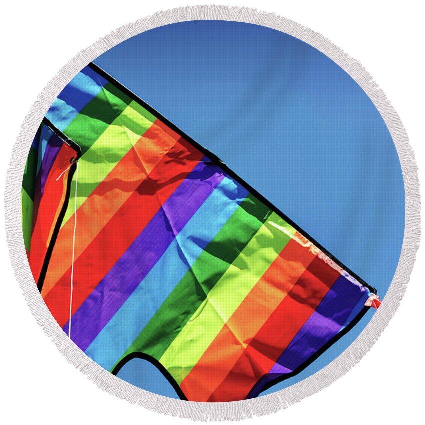 Summer Round Beach Towel featuring the photograph Hello Summer sample text with bright colorful kite flying high o by Milleflore Images