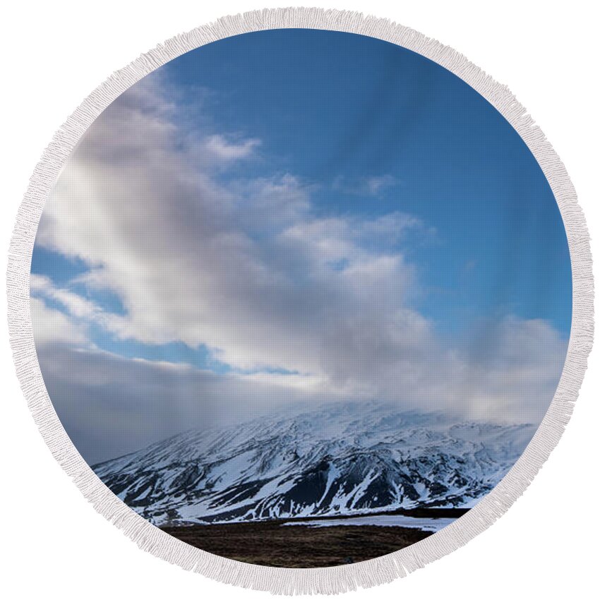 Iceland Round Beach Towel featuring the photograph Icelandic landscape with mountains covered in snow at snaefellsnes peninsula in Iceland by Michalakis Ppalis