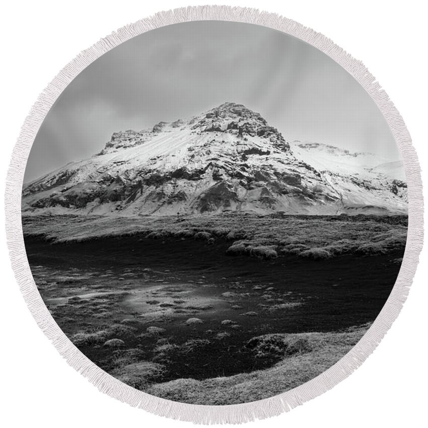 Iceland Round Beach Towel featuring the photograph Icelanding mountain landscape. Snowy mountain winter by Michalakis Ppalis