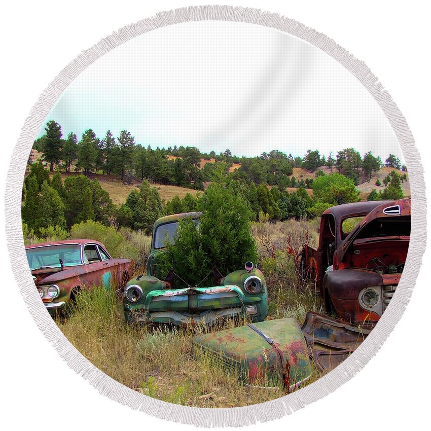 Old Rusty Pickups Round Beach Towel featuring the photograph Junkyard Series Rusty Pickups by Cathy Anderson