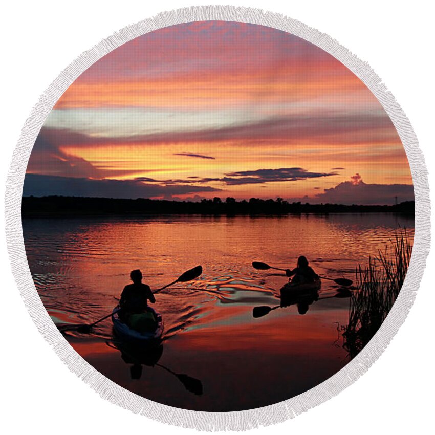 Kayaks At Beautiful Nimisila Reservoir In The City Of Green Round Beach Towel featuring the photograph Kayaks at Red Sunset by Mary Walchuck
