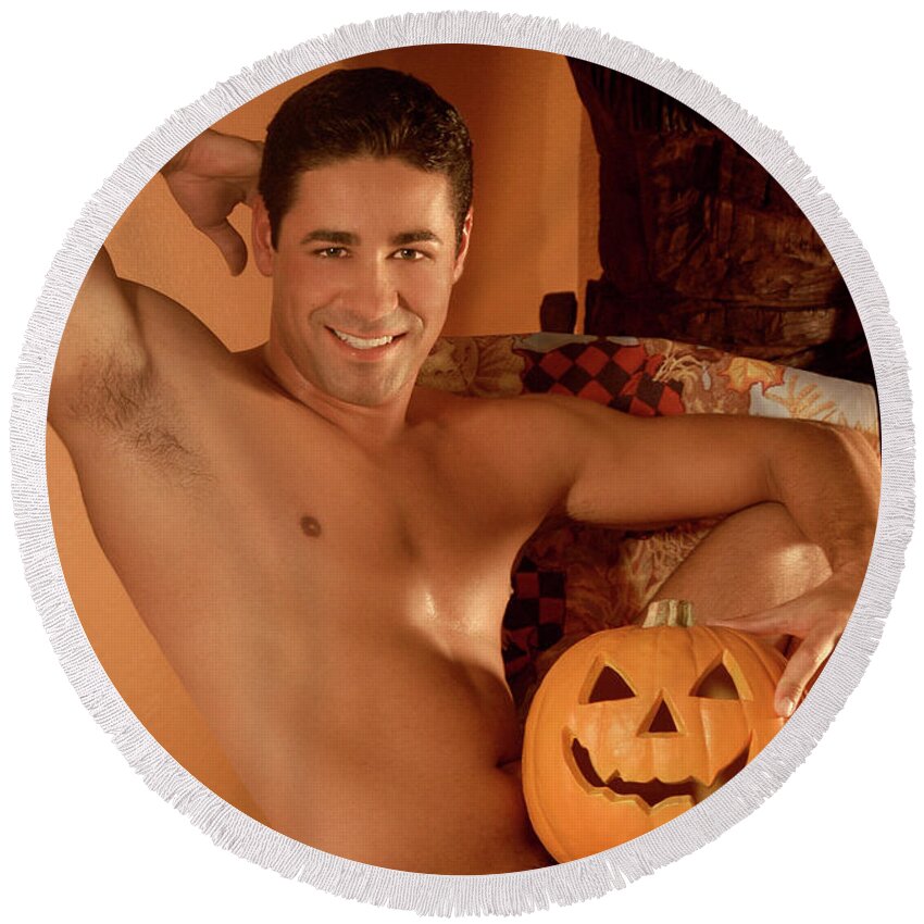 Young Round Beach Towel featuring the photograph Male nude with Halloween Pumpkin by Gunther Allen