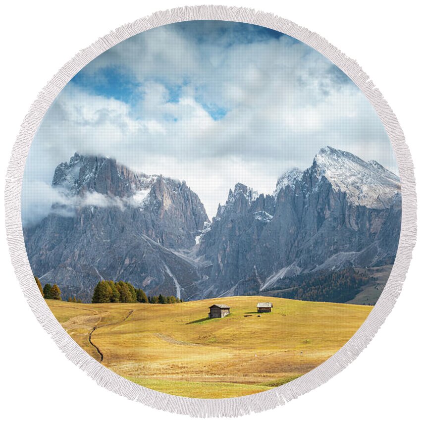 Mountain Landscape Round Beach Towel featuring the photograph Meadow field and the Dolomiti rocky peaks Alpe di siusi Seiser Alm Italy by Michalakis Ppalis