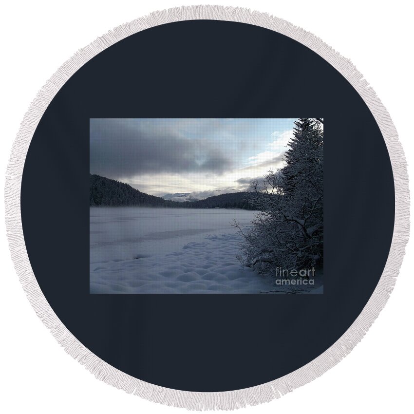 #alaska #juneau #ak #cruise #tours #vacation #peaceful #aukelake #snow #winter #cold #postcard #morning #dawn Round Beach Towel featuring the photograph Mist on a frozen lake by Charles Vice