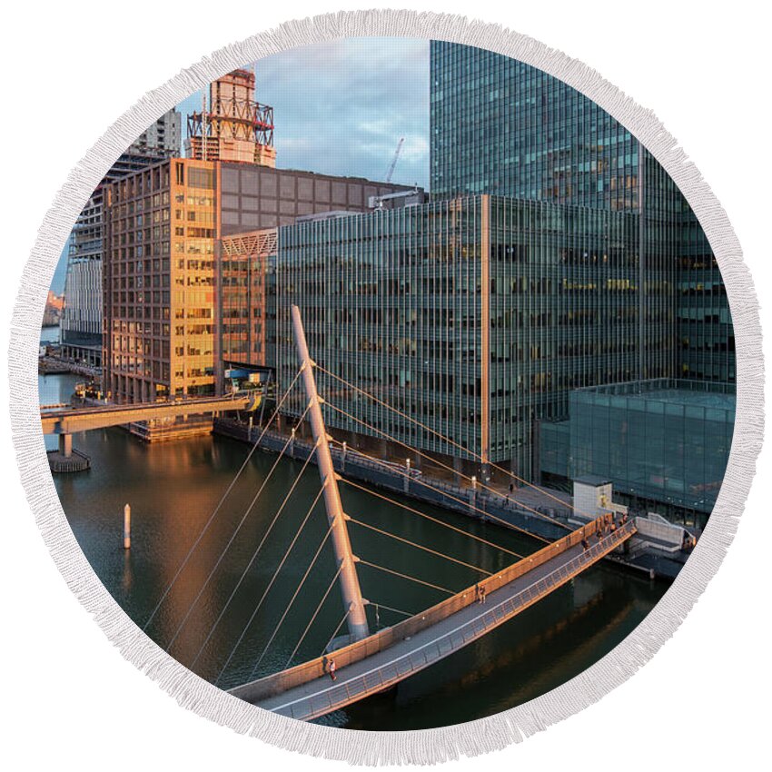 Canary Wharf Round Beach Towel featuring the photograph Modern office building in the Canary Wharf financial centre in the evening. London united kingdom by Michalakis Ppalis