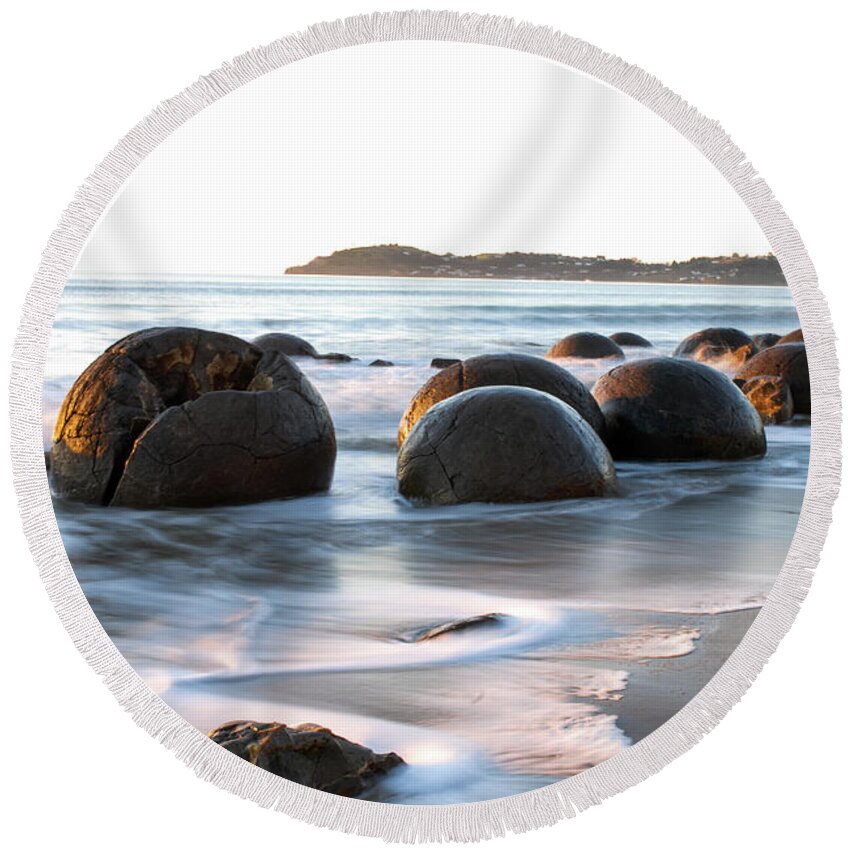 Moeraki Round Beach Towel featuring the photograph Tranquility - Moeraki Boulders, South Island. New Zealand by Earth And Spirit