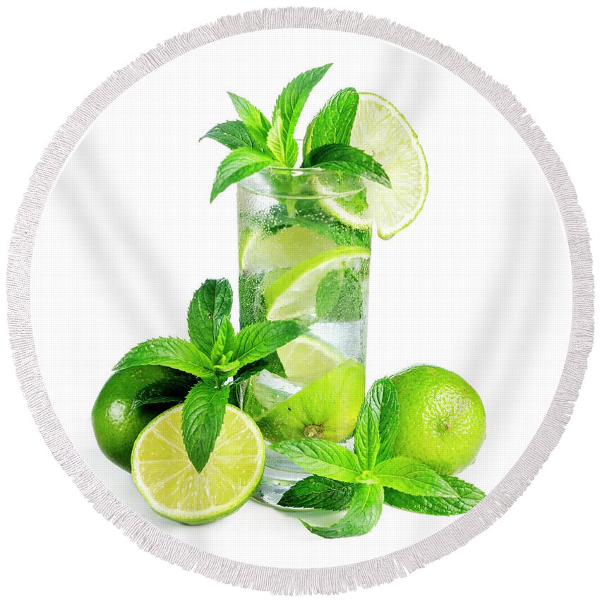 Mojito Round Beach Towel featuring the photograph Mojito cocktail with ice isolated over white background. by Jelena Jovanovic