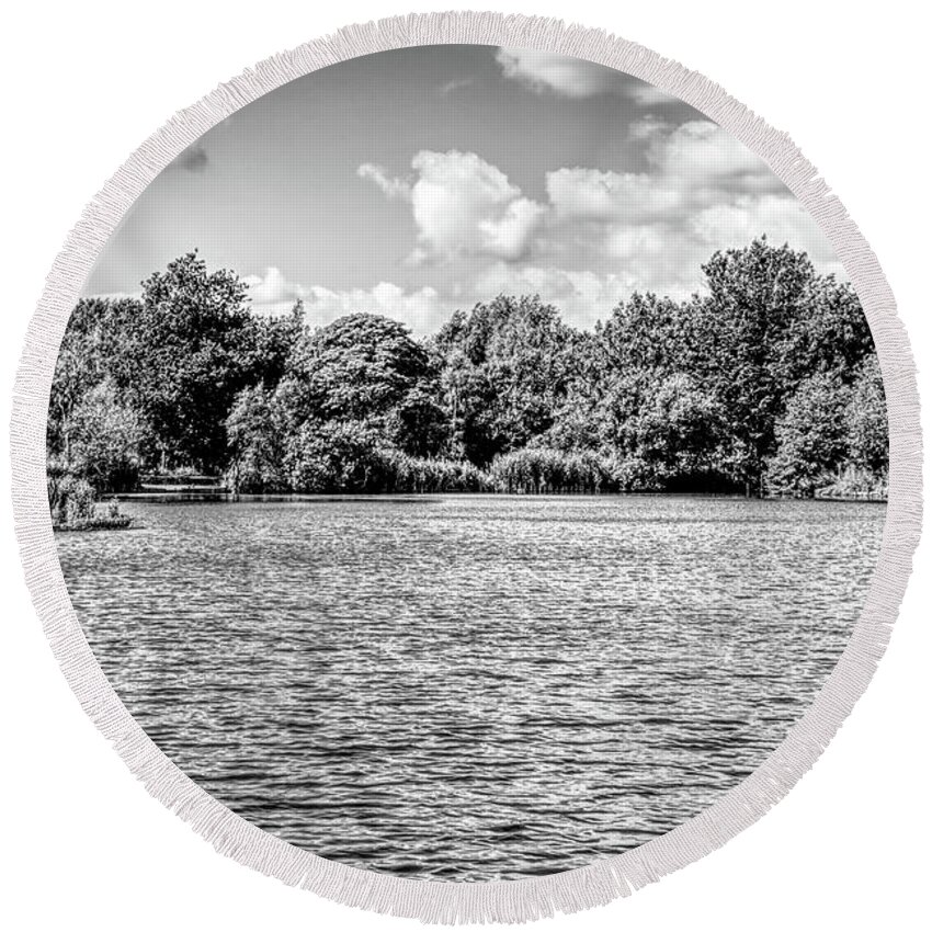 Monochrome Round Beach Towel featuring the photograph Monochrome of clouds over Alkington Woods fishing lake by Pics By Tony