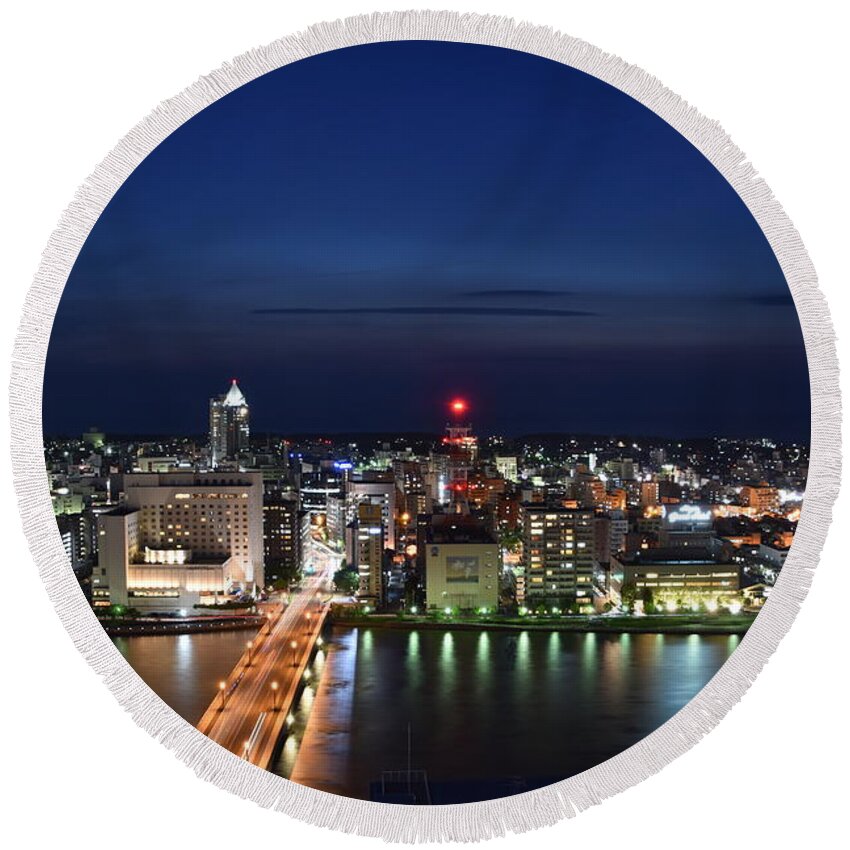 Night Round Beach Towel featuring the photograph Night view of Niigata in Japan by Yujun