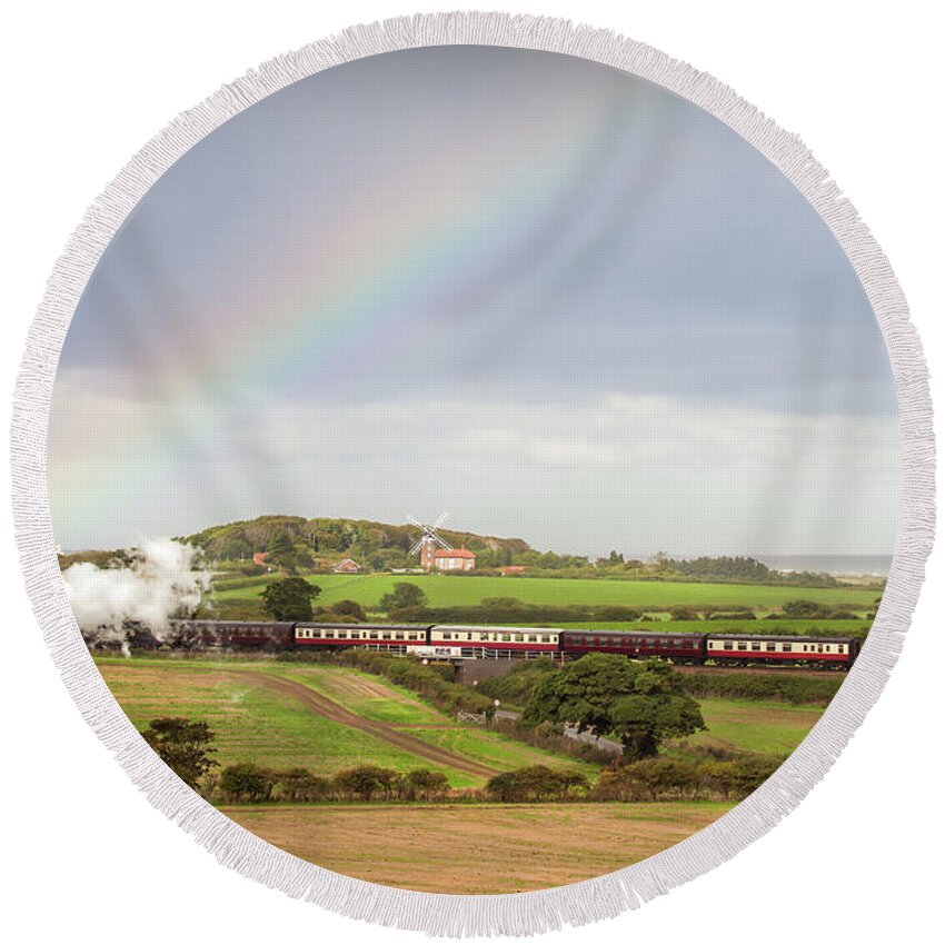 Weybourne Round Beach Towel featuring the photograph Norfolk steam train with Weybourne windmill and rainbow by Simon Bratt