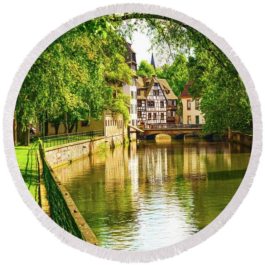 France Round Beach Towel featuring the photograph Petite France canal in Strasbourg by Stefano Orazzini
