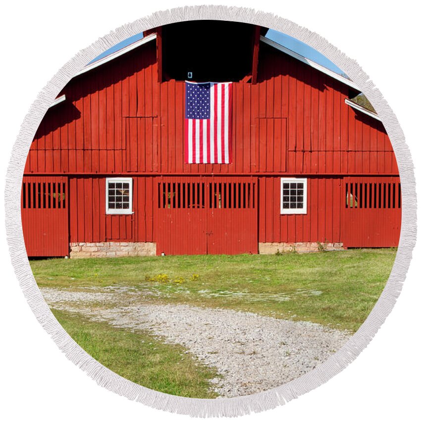 Red Barn Round Beach Towel featuring the photograph Red Barn with American Flag - Tennessee III by Brian Jannsen