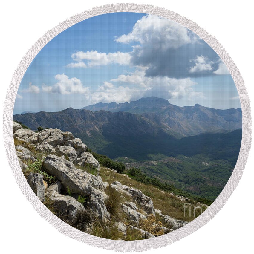 Mountains Round Beach Towel featuring the photograph Rocks and clouds by Adriana Mueller