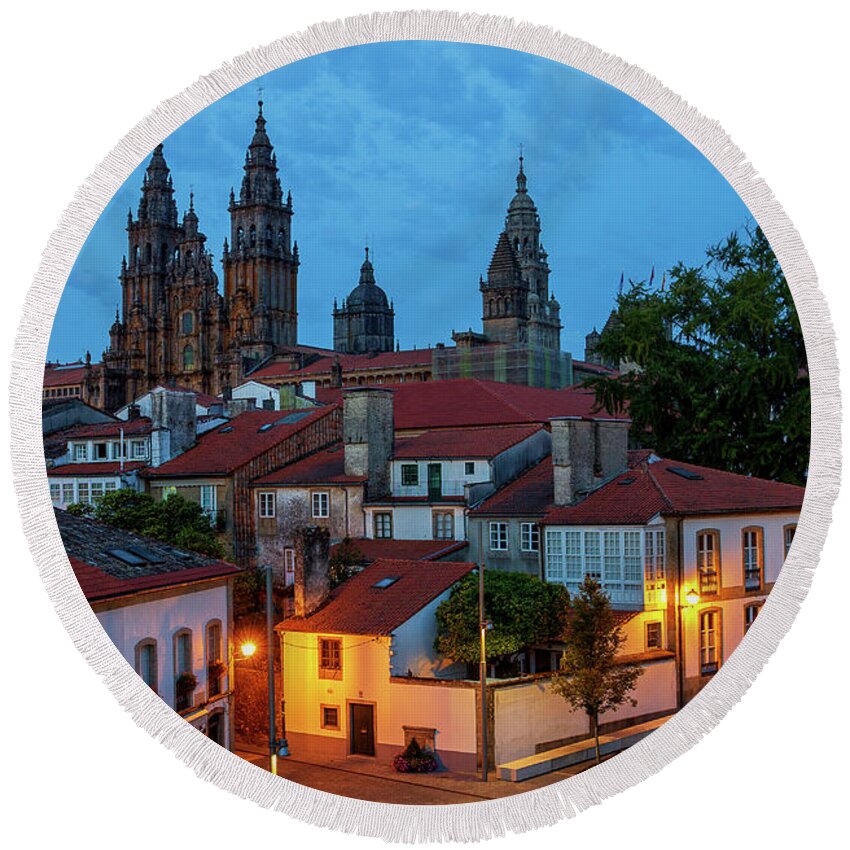 Way Round Beach Towel featuring the photograph Santiago de Compostela Cathedral Spectacular View by Night Dusk with Street Lights and Tiled Roofs La Corua Galicia by Pablo Avanzini
