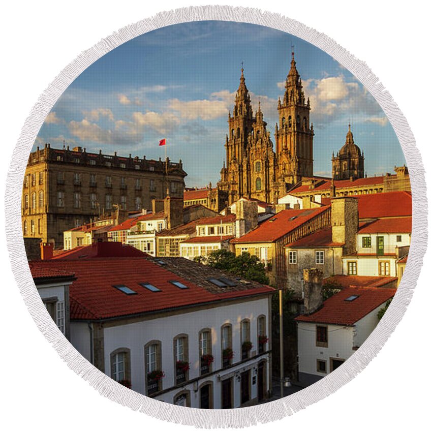 Way Round Beach Towel featuring the photograph Santiago de Compostela Cathedral Spectacular View with Sun Light Hitting the facade and Tiled Roofs La Corua Galicia by Pablo Avanzini
