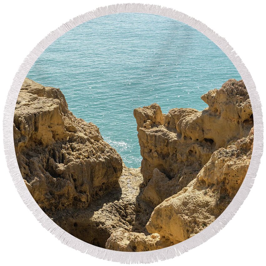 Sea Sculpted Round Beach Towel featuring the photograph Sculpted Clifftops - Carvoeiro Algarve Gold Coast in Portugal by Georgia Mizuleva