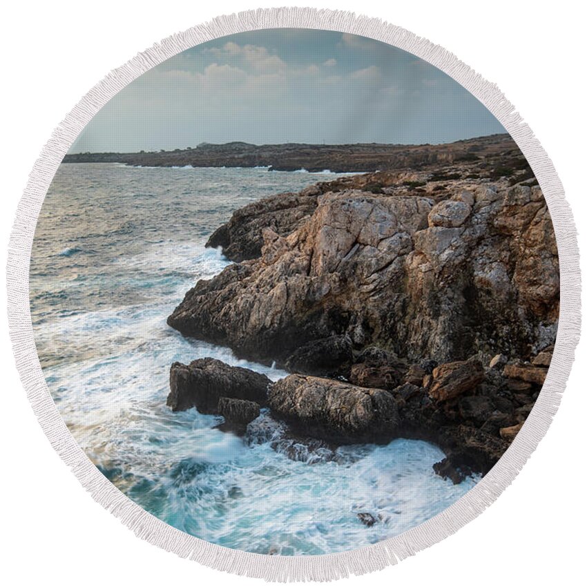 Stormy Sea Round Beach Towel featuring the photograph Seascape with windy waves during stormy weather at sunset. by Michalakis Ppalis