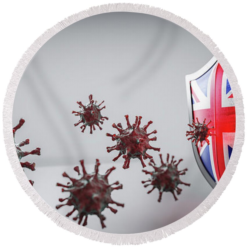 Shield Round Beach Towel featuring the photograph Shield in UK flag protect from coronavirus COVID-19. by Michal Bednarek