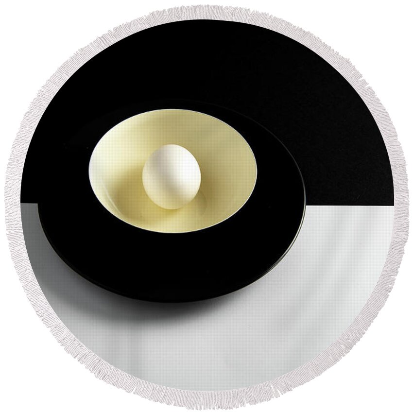 Still-life Round Beach Towel featuring the photograph Single fresh white egg on a yellow bowl by Michalakis Ppalis