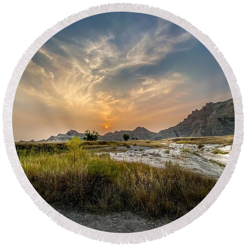 National Park Round Beach Towel featuring the photograph Smoky Sunset at Badlands by Susan Rydberg