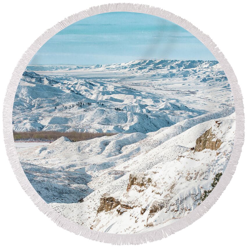 A Winter's View Of The Snowy Landscape In The Judith River Breaks Near Winifred Round Beach Towel featuring the photograph Snowy Breaks by Todd Klassy