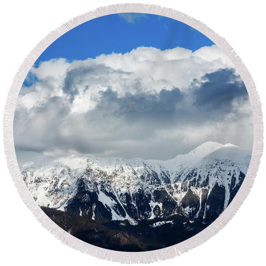 Mountain Round Beach Towel featuring the photograph Snowy mountains by Ian Middleton