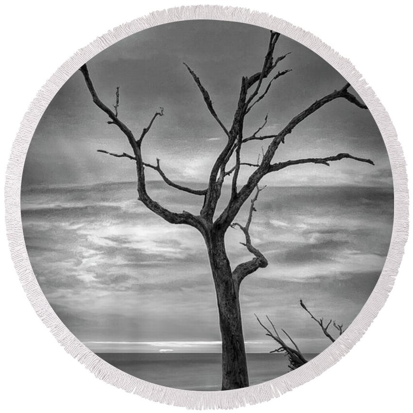 Clouds Round Beach Towel featuring the photograph Standing Alone on Jekyll Island Driftwood Beach Black and White by Debra and Dave Vanderlaan