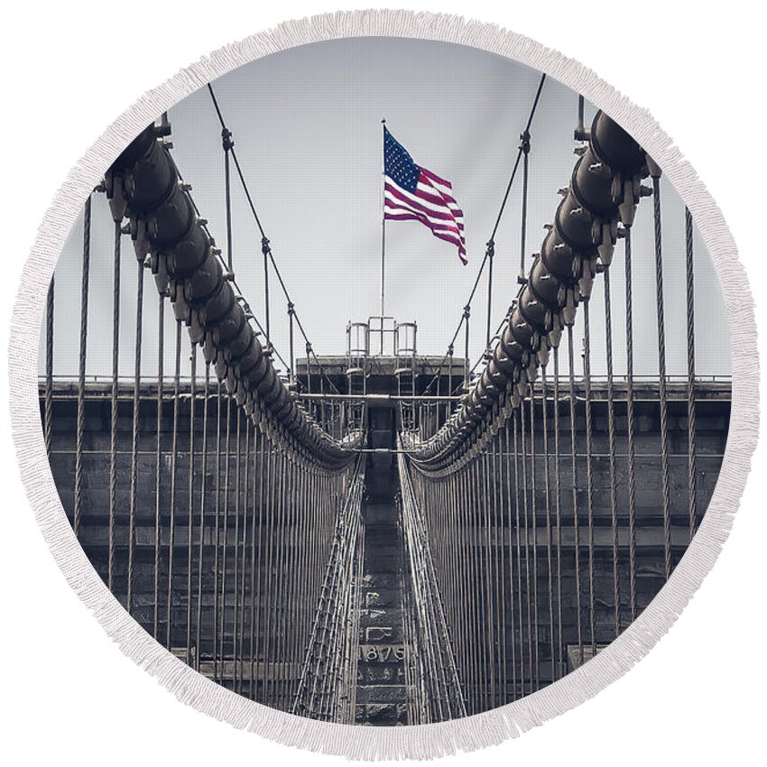 America Round Beach Towel featuring the photograph Stars and stripes above Brooklyn bridge by Jean-Luc Farges