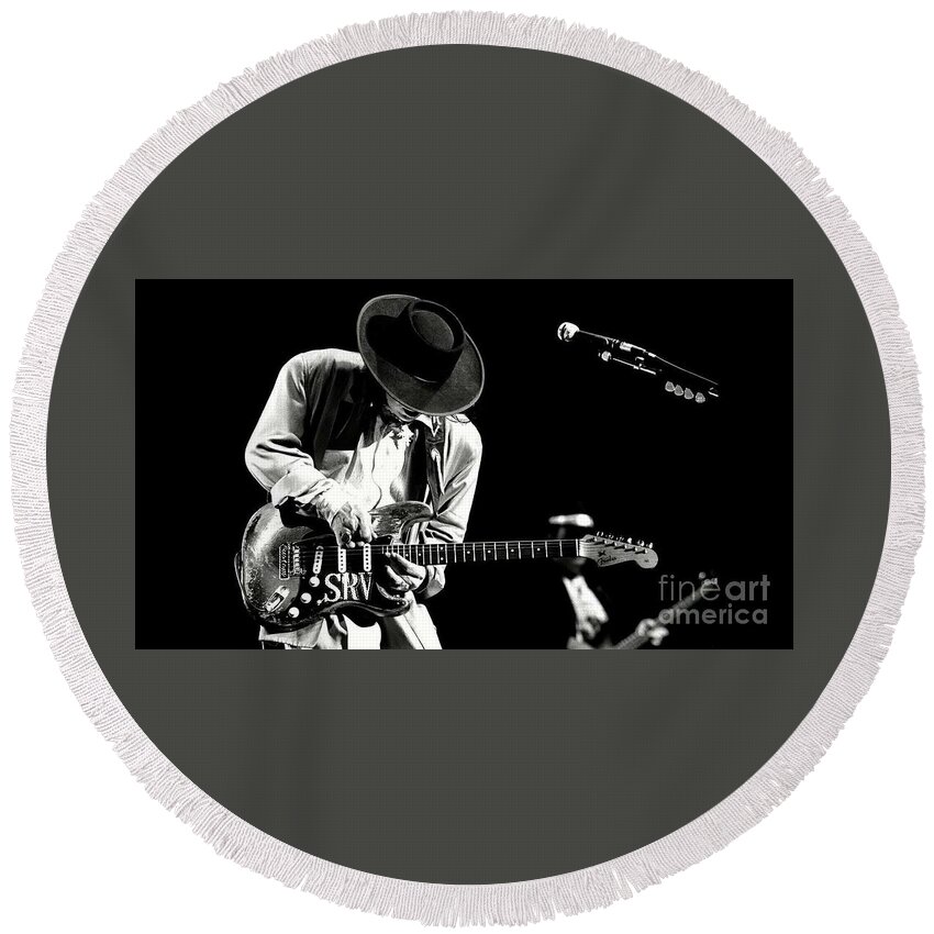 Stevie Ray Vaughan Round Beach Towel featuring the photograph Stevie Ray Vaughan in concert by Action