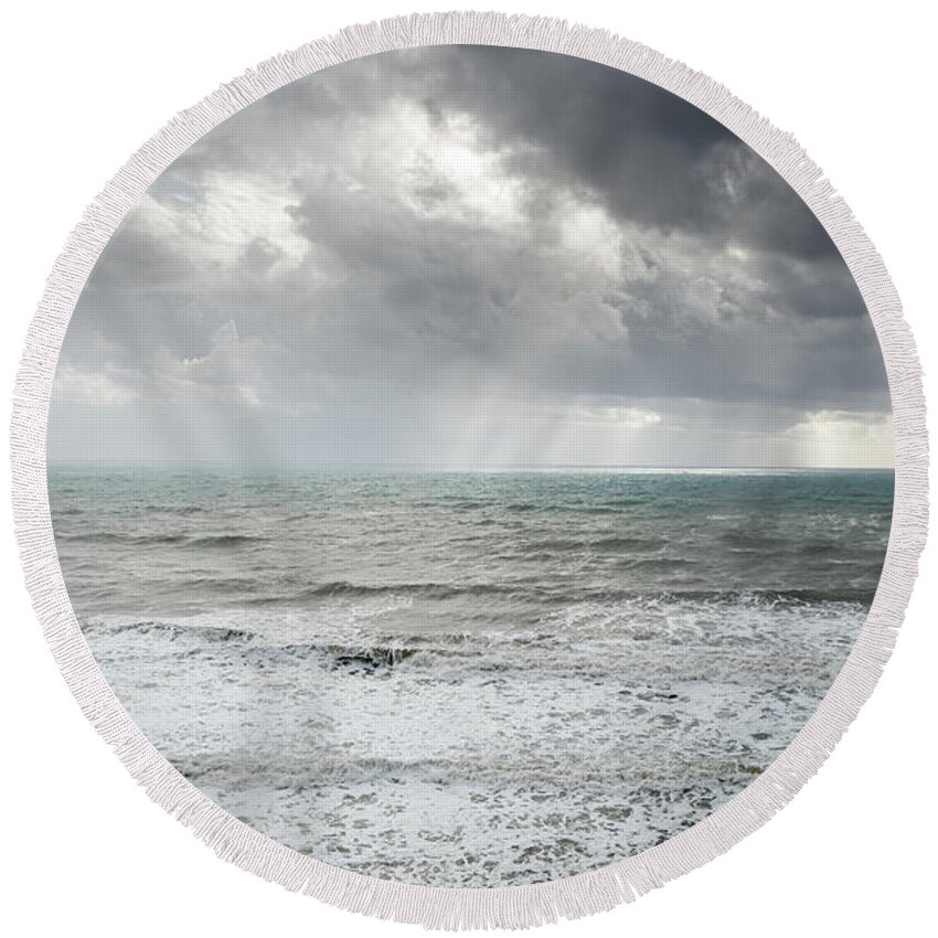 Stormy Sea Round Beach Towel featuring the photograph Stormy sea and dramatic sky by Michalakis Ppalis