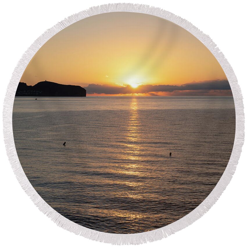 Sunrise Round Beach Towel featuring the photograph Sunrise on the Mediterranean coast in Spain by Adriana Mueller