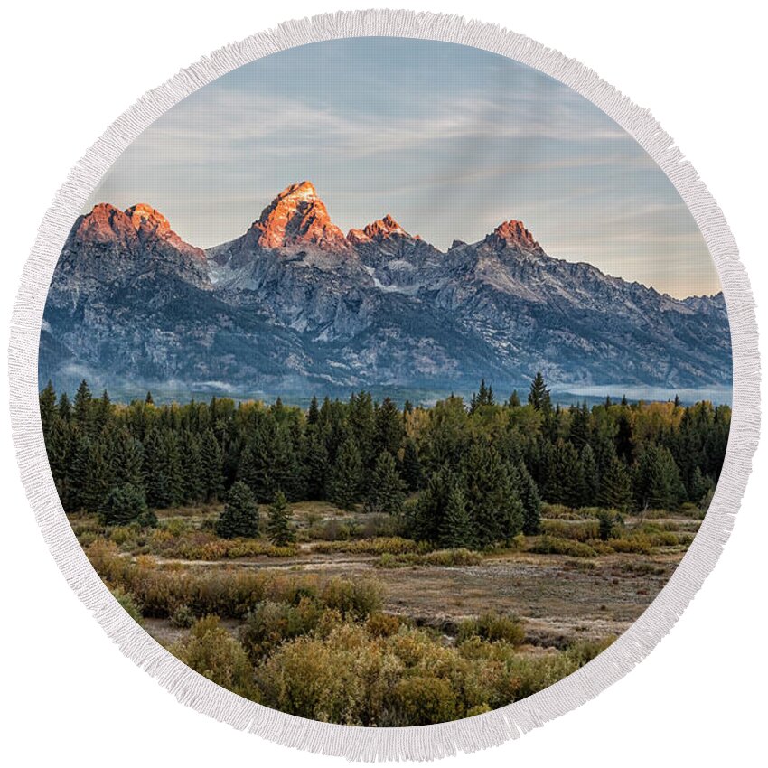 Sunrise Round Beach Towel featuring the photograph Sunrise over the Grand Tetons from Blacktail Ponds Overlook, No. 1 by Belinda Greb