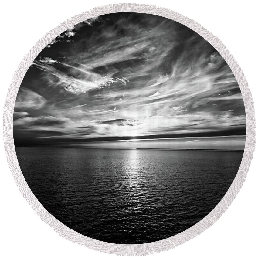 Sunset Round Beach Towel featuring the photograph Sunset on the horizon at sea by Bernhard Schaffer