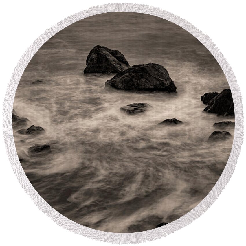 Long Exposure Round Beach Towel featuring the photograph Swirling waters, long exposure by the sea by Alessandra RC