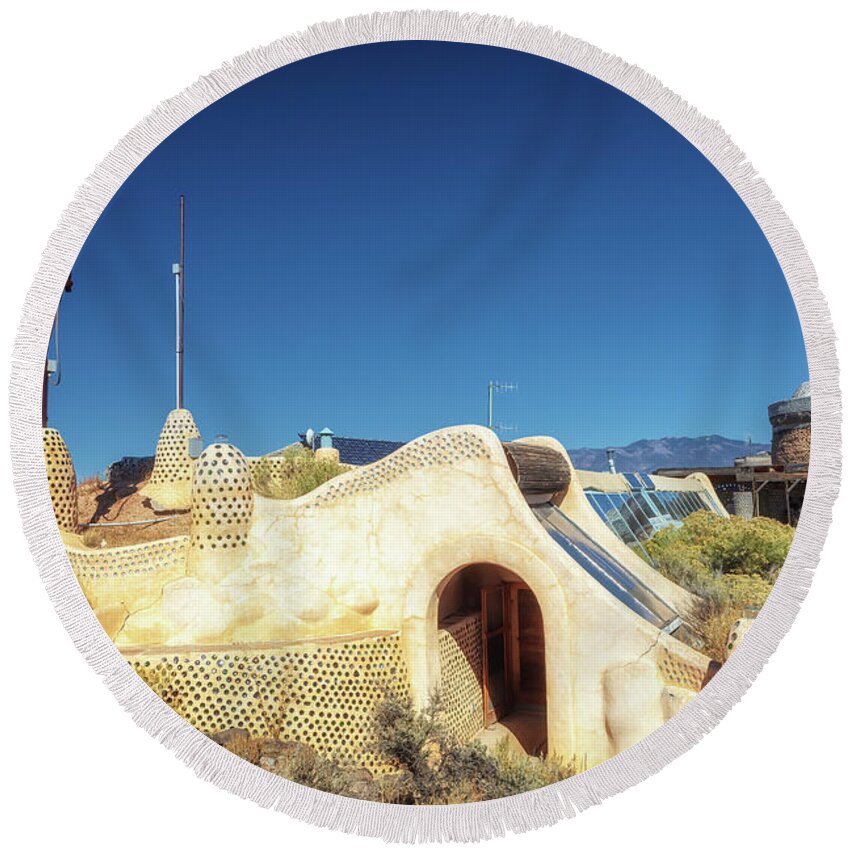 Taos Round Beach Towel featuring the photograph Taos Earthship by Susan Rissi Tregoning