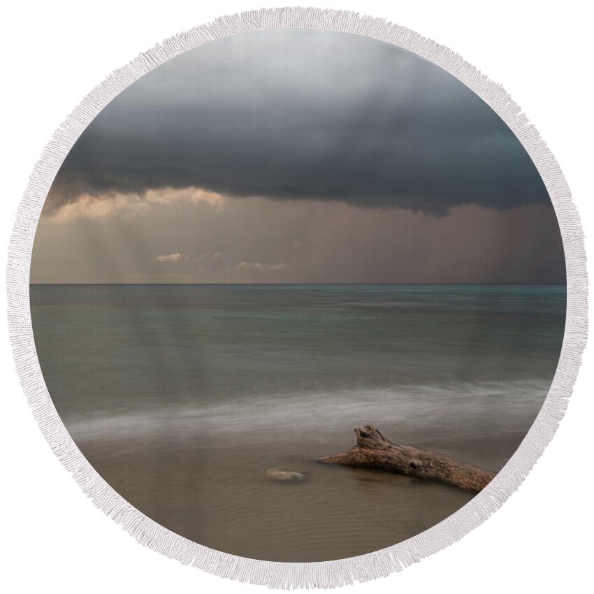 Storm Round Beach Towel featuring the photograph The coming of the storm from ocean by Michalakis Ppalis