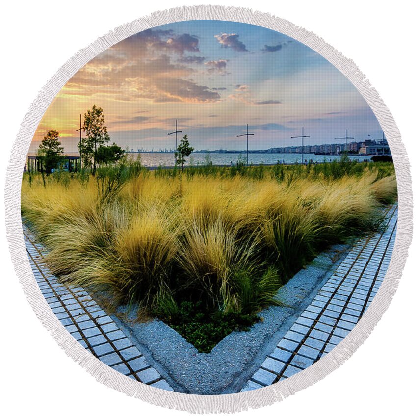 Thessaloniki Round Beach Towel featuring the photograph The garden of the afternoon sun in Thessaloniki by Alexios Ntounas